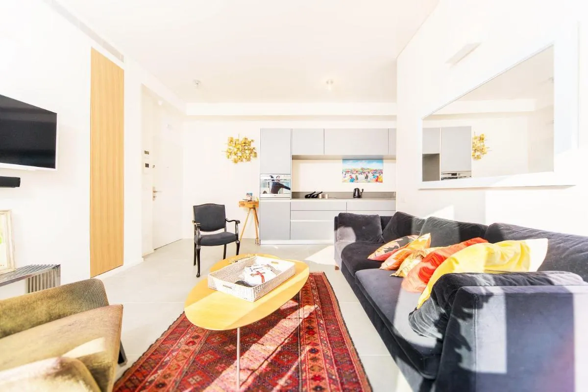 Image 2 of Bright 1BR Apartment w Balcony & Mamad 10 min Walk from Beach by Sea N’ Rent