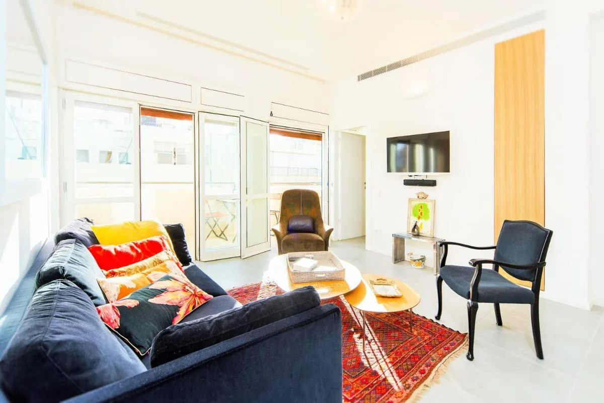 Image 1 of Bright 1BR Apartment w Balcony & Mamad 10 min Walk from Beach by Sea N’ Rent