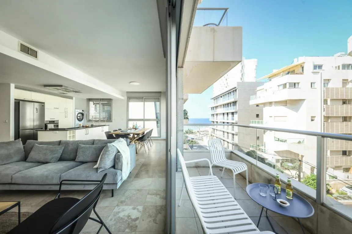 Image of Chic Apartment w Balcony, Mamad & Parking 3-min from Beach by Sea N’ Rent