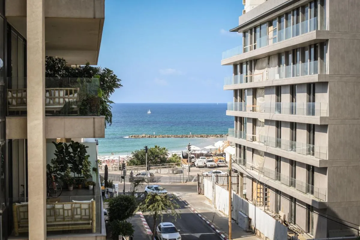 Image 2 of Chic Apartment w Balcony, Mamad & Parking 3-min from Beach by Sea N’ Rent