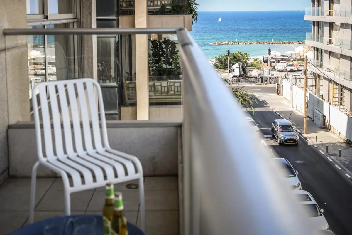 Image 3 of Chic Apartment w Balcony, Mamad & Parking 3-min from Beach by Sea N’ Rent