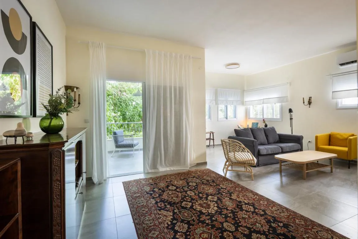 Image of Eclectic Dreams Rabin Square Apt with Shelter by Sea N’ Rent