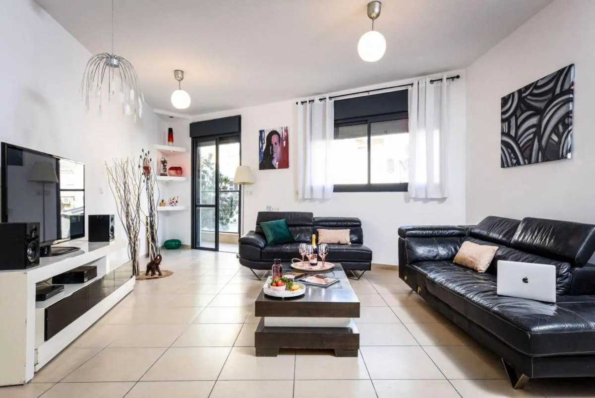 Image 1 of Stunning 2BR Apt w Balcony in City Center with Mamad by Sea N’ Rent