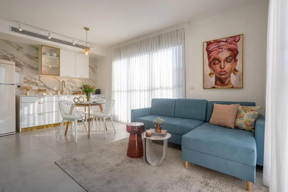 Image 3 of YalaRent Flora- Designed 1BR penthouse in Florentin